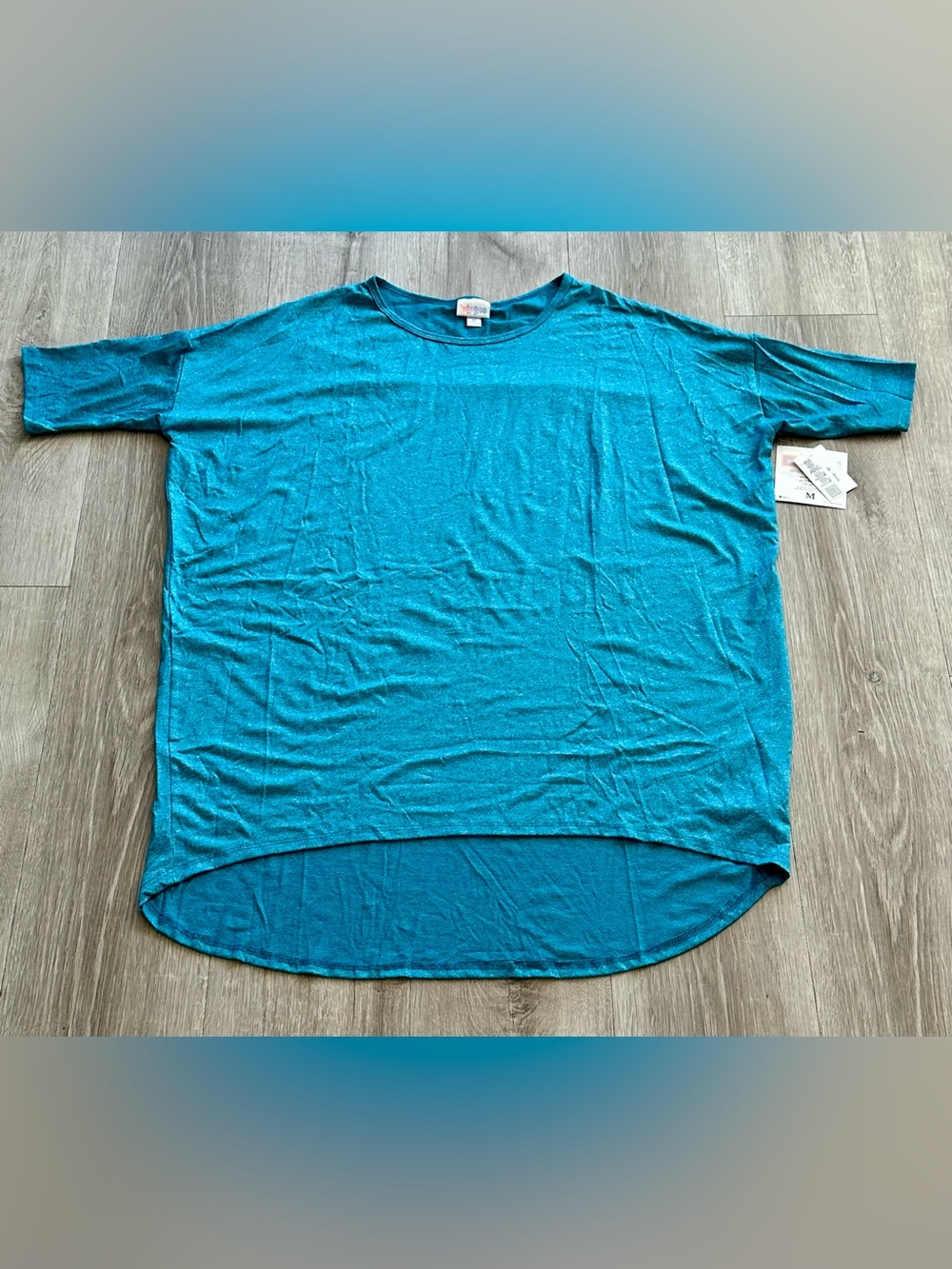 LuLaRoe Women’s Teal Short Sleeve Irma Tunic Shirt Size Medium